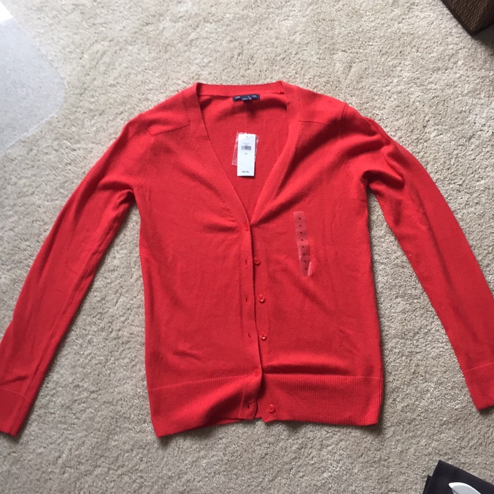 Orangey-red six button cardigan
